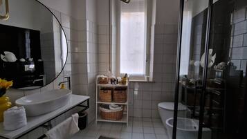 Shower, eco-friendly toiletries, hair dryer, bidet