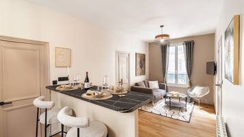 Superior Apartment | Living room | 80-cm plasma TV with digital channels