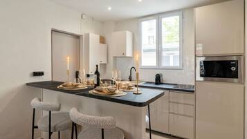 Superior Apartment | Private kitchen | Microwave, stovetop, espresso maker, electric kettle