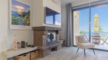 Exclusive Apartment, Ocean View | Living area | 45-inch flat-screen TV with cable channels