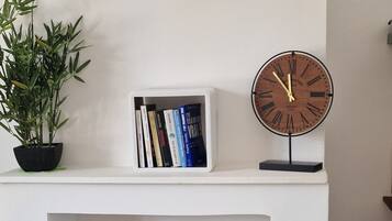 Comfort Apartment, City View | Living area | 80-cm flat-screen TV with digital channels