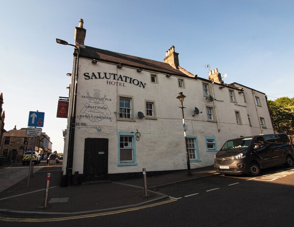 A traditional pub and hotel named 'Salutation' with a sign indicating it is family friendly.