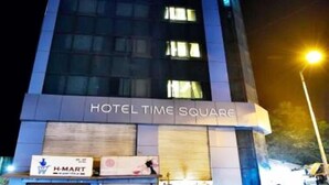A building with the sign "HOTEL TIME SQUARE" indicating it is a hotel. - Hotel Time Square (Thane)