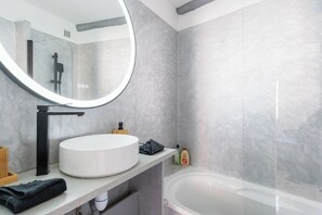 Hair dryer, towels, soap, shampoo
