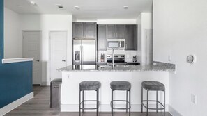 Fridge, microwave, oven, stovetop - Landing | Stunning 1BD, Pool, Gym (Manor)