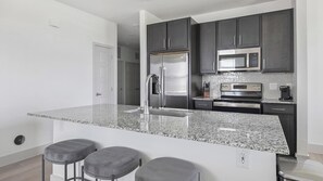 Fridge, microwave, oven, stovetop - Landing | Spectacular 2BD, Pool, Gym (Manor)