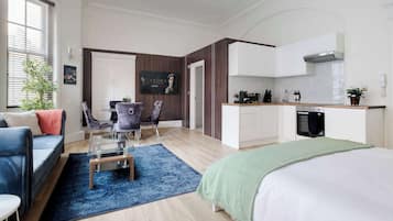 1 bedroom, desk, iron/ironing board, travel crib