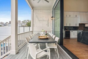 Outdoor dining - 2 Designer Homes, 14 Bedrooms | Walk to St Charles (New Orleans)