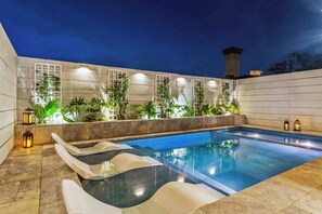 A heated pool - 2 Designer Homes, 14 Bedrooms | Walk to St Charles (New Orleans)