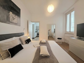 1 habitación, tabla de planchar con plancha, cuna de viaje y wifi 