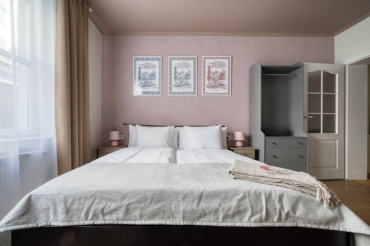 Down duvets, desk, iron/ironing board, free cots/infant beds
