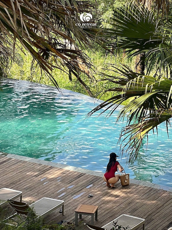 Outdoor pool, pool umbrellas, sun loungers