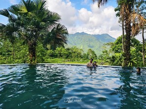Outdoor pool, pool umbrellas, sun loungers