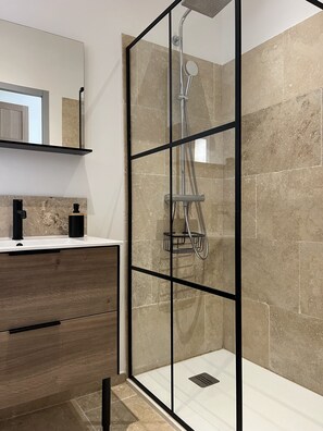 Shower, hair dryer, towels, soap