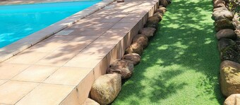 Comfortable guest room with terrace, large swimming pool (+ kitchen)