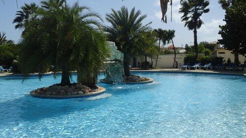 Cozy studio in resort Seru Coral in Curacao with communal pool.