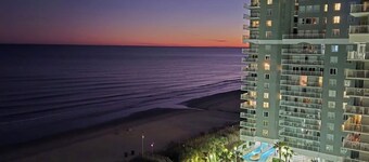 View the OCEAN from the Cali King bed in SeaWatch Resort North Tower