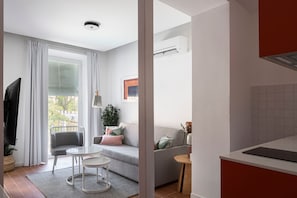 Apartment, 2 Bedrooms | Living area | 50-cm Smart TV with cable channels