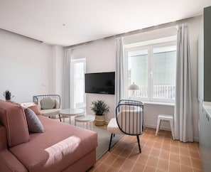 Apartment, 3 Bedrooms | Living area | 50-cm Smart TV with cable channels