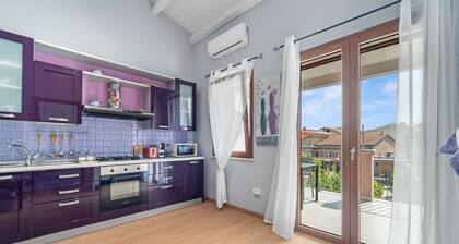 Ferienwohnung 'Di Pina' mit privater Terrasse, Gemeinschaftsgarten und Klimaanlage