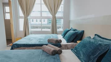 3 habitaciones, tabla de planchar con plancha, wifi y ropa de cama