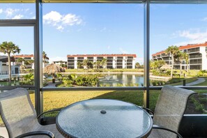 Outdoor dining - Ground-Floor Gulf-View Escape – Comfort & Coastal Charm Await in Unit D-7 (Sanibel)