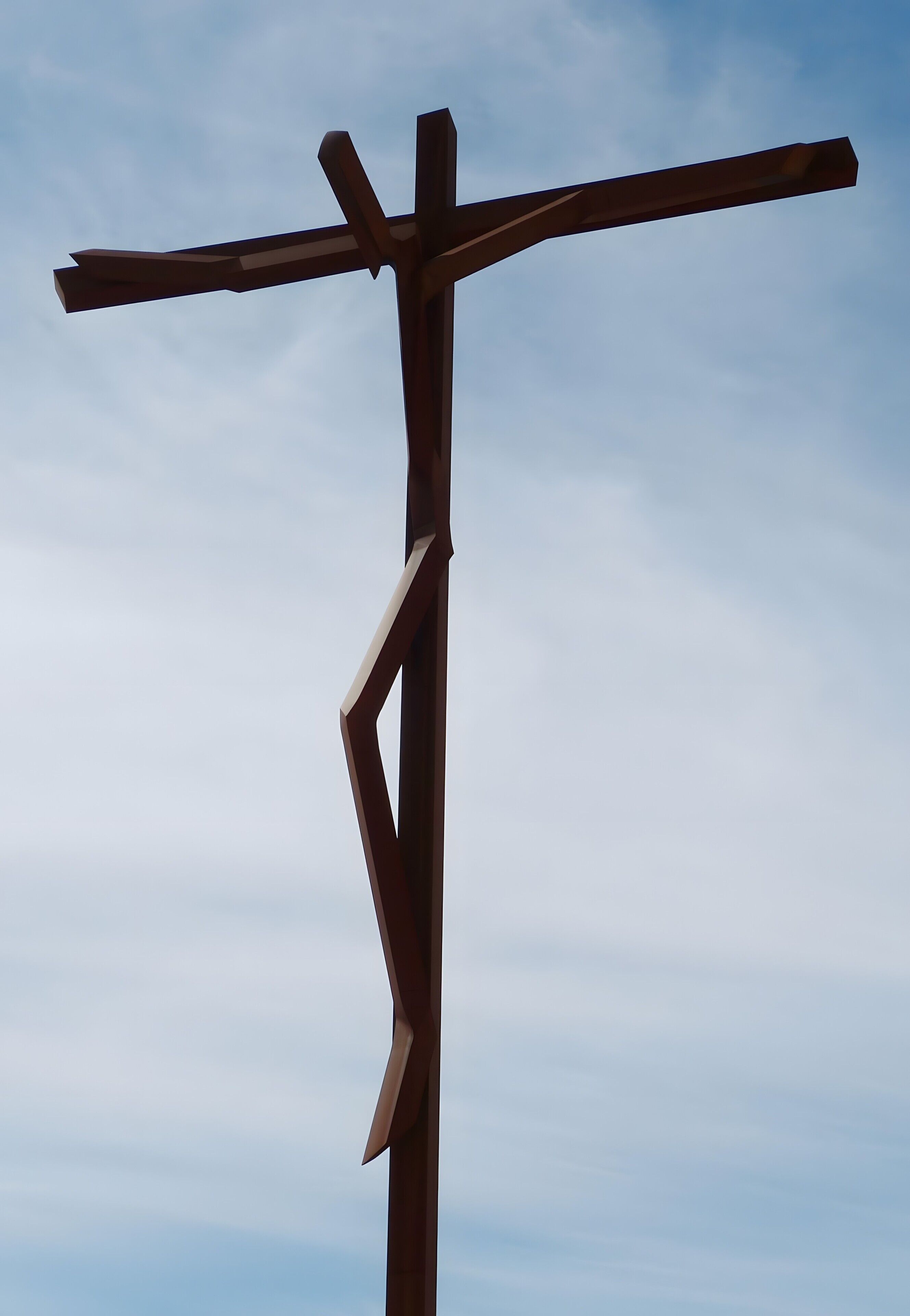 Una estructura de madera en forma de cruz contra un cielo despejado.