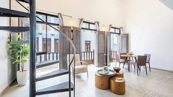 Loft, 2 Bedrooms, Balcony, City View | Living area | 50-inch Smart TV with digital channels, Netflix, Hulu