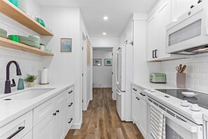 Fridge, microwave, dishwasher, coffee/tea maker