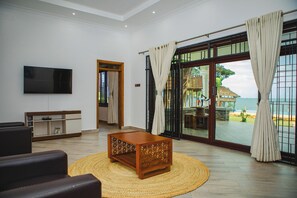 Superior House, Kitchen, Ocean View | Living area | 50-inch Smart TV with digital channels