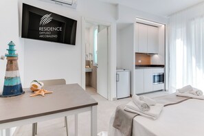 1 quarto, cofres nos quartos, ferros/tábuas de passar roupa