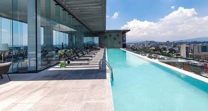 Minerva retreat w/ pool, gym & skyline views