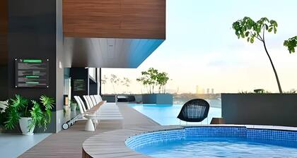 Bright 2BR w/ pool access & hot tub