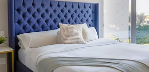 2 slaapkamers, een strijkplank/strijkijzer, beddengoed