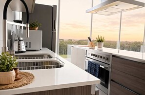 Coffee/tea maker, fridge, microwave, oven