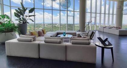 City-view 2BR w/ pool & gym access