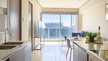 Fridge, microwave, stovetop, coffee/tea maker