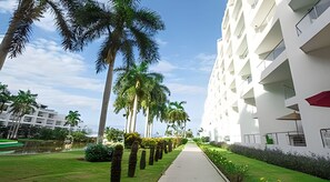 Experience the serene atmosphere of Del Mar, surrounded by lush greenery and manicured lawns.