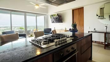 Fridge, microwave, cookware/dishes/utensils