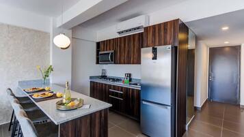 Fridge, microwave, cookware/dishes/utensils