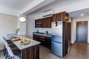 Fridge, microwave, cookware/dishes/utensils