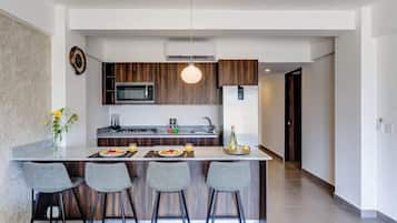 Fridge, microwave, cookware/dishes/utensils