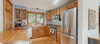 Spacious Lakefront Home with a Sandy Beach, Kayaks, and Stunning Panoramic Views