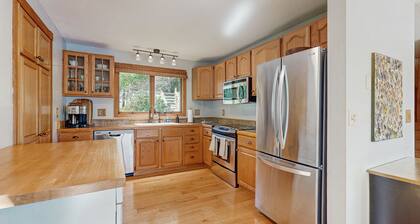 Spacious Lakefront Home with a Sandy Beach, Kayaks, and Stunning Panoramic Views