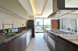 Fridge, microwave, cookware/dishes/utensils, dining tables