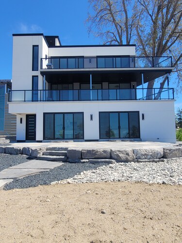 Welcome to BeachBabe, right on the main beach with incredible views!