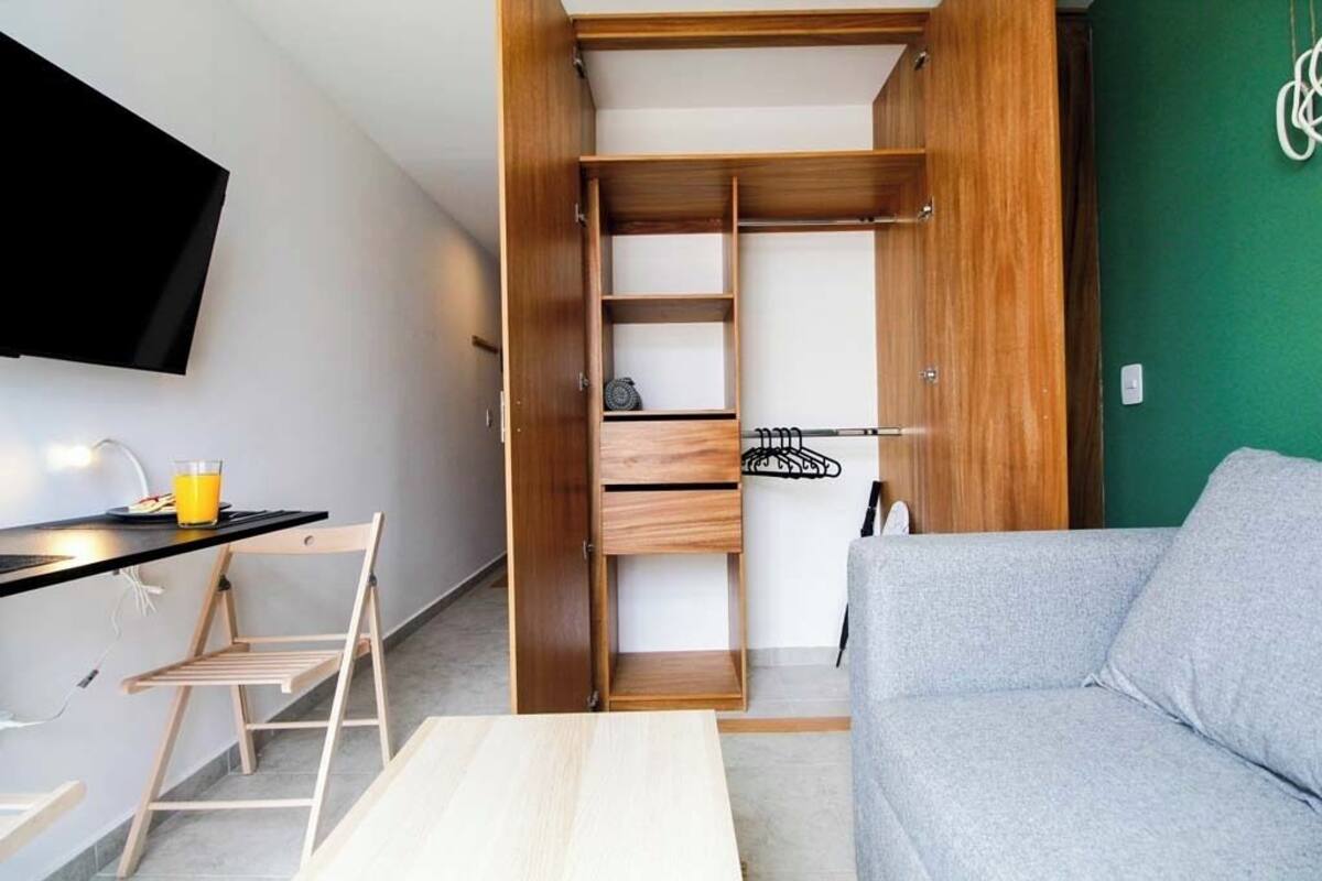 Deluxe Studio | Laptop workspace, blackout curtains, iron/ironing board, free WiFi