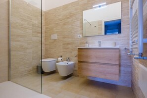 Hair dryer, towels, soap, toilet paper