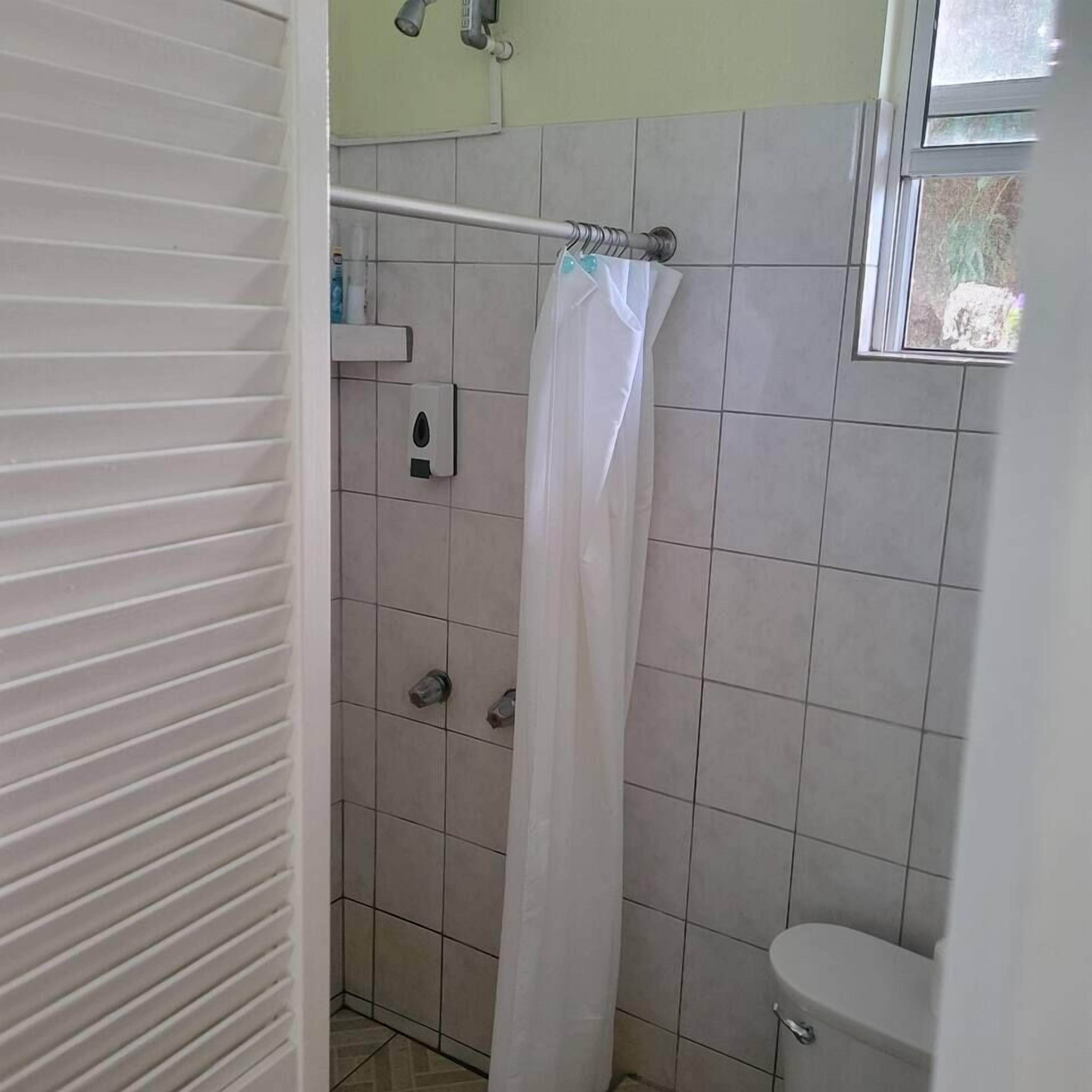 Shower, towels, soap, shampoo
