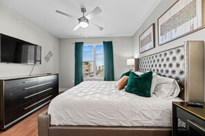 1 bedroom, desk, iron/ironing board, travel crib